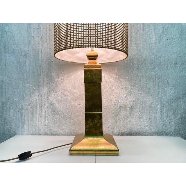 1 large table or floor lamp from the 1960s/70s, 2-bulb, E27 socket. Gold-plated ceramic lamp base, fabric and gold metal...