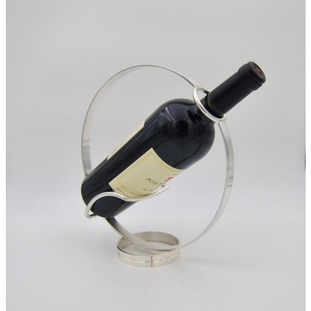 A vintage Christofle of Paris wine bottle holder, stand, and pourer designed by Bernard Yot at the end of the 20th century...