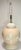 This creme and white Hollywood Regency ceramic lamp is for the dimensional band of leaves encircling its traditional...