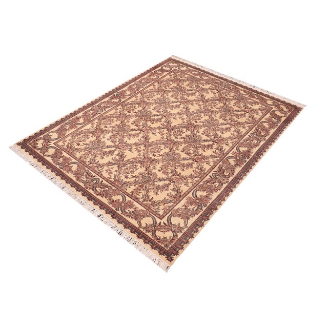 Designed with mesmerizing intricacy and gorgeous color palette, this hand-knotted masterpiece demonstrates the beauty and...