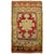 An early 20th century full even pile condition cherry red color Turkish rug. 1'11'' x 3'