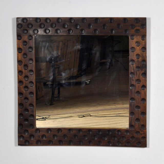 Brutalist mirror from the 1970s with a solid oak frame. The robust design with characteristic relief details gives this...