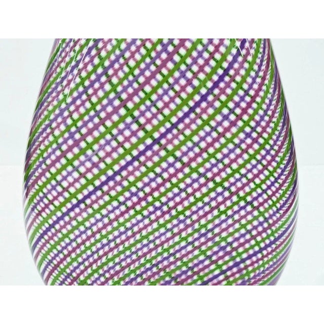 Bryan Rubino. Born 1958 in Washington state. Untitled #3 1997 Blown Glass Vase. Multi-colored filigrana vase of tear drop...