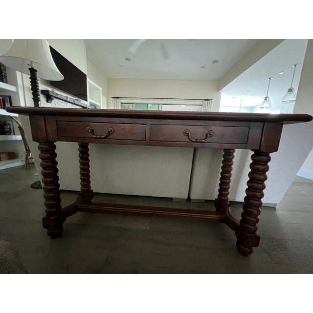 This piece is a beautiful heavy solid wood console table. I bought it from Colorado Style back in the mid 2000’s. It has 2...