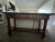 This piece is a beautiful heavy solid wood console table. I bought it from Colorado Style back in the mid 2000’s. It has 2...