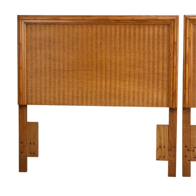Great pair of vintage twin headboards with woven rattan panels framed in decorative bamboo style wood trim. Each headboard...