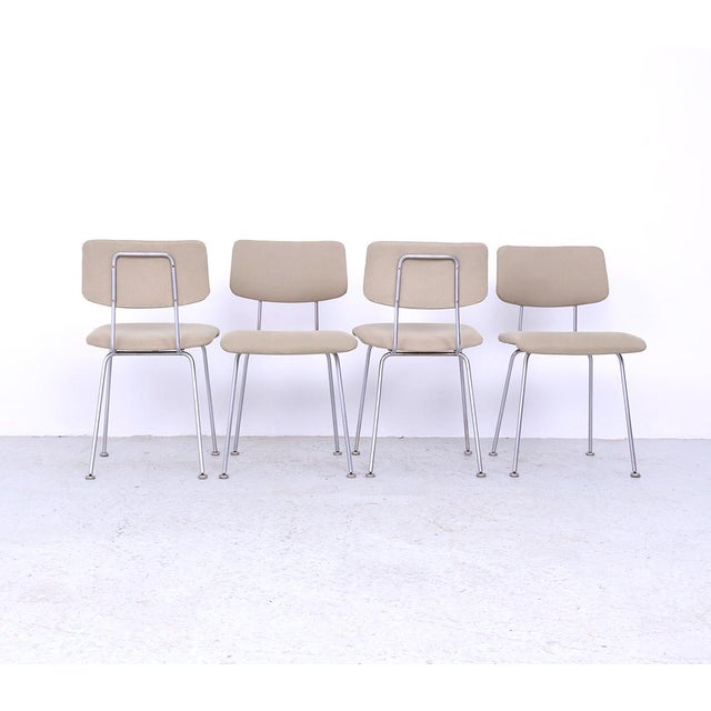 Set of 4 gispen chairs model 1263 designed by a.r. Cordemeijer in the 1960s. the chairs have a slim chrome frame and are...