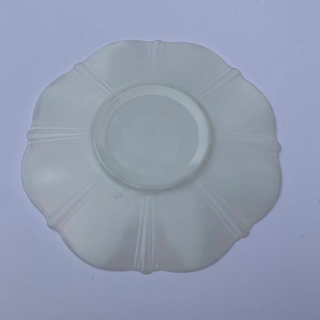 A clean white translucent chop plate platter to serve your delicacies designed by MacBeth Evans in the 1930s..