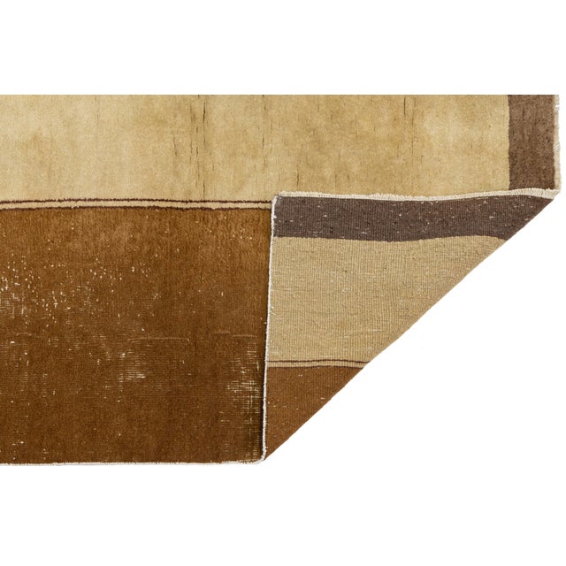 This striking antique Chinese runner showcases the sophisticated minimalism often associated with the Art Deco movement of...