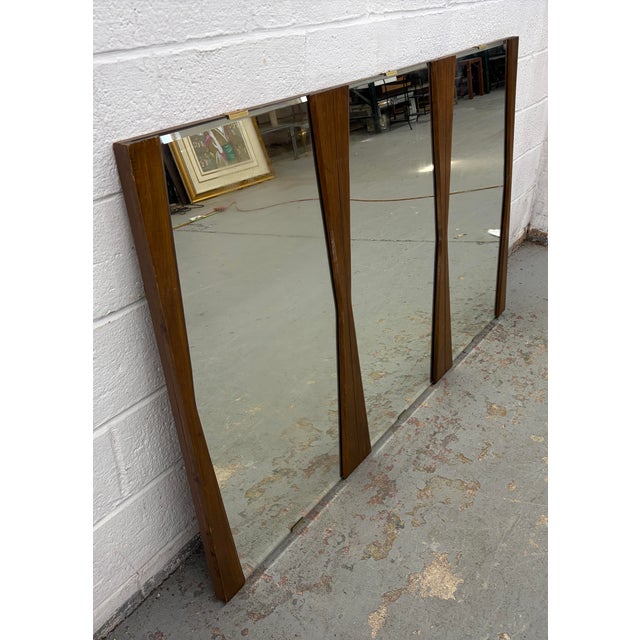Make a statement with this Unique Mid-Century Wall Mirror, a striking accent piece that captures the clean lines and...