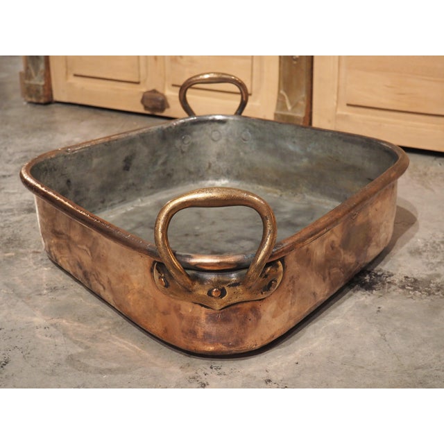 This heavy tin-lined French copper fish poacher, known as a turbotiere, dates to circa 1850 and was produced by the well-...