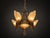 A striking example of American Art Deco lighting, this authentic Mid West Manufacturing Soleure Series 6-light chandelier...