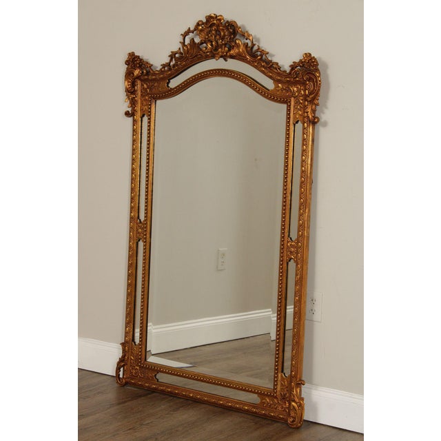 Impressive Large-Scale Wall Mirror Featuring an Elaborately Carved Giltwood Style Frame with Rich Rococo and Baroque...