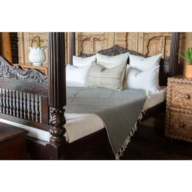 A hand-loomed cotton quilted throw. Soft in texture and accented with tassels on both ends. Beautiful reversible throw...