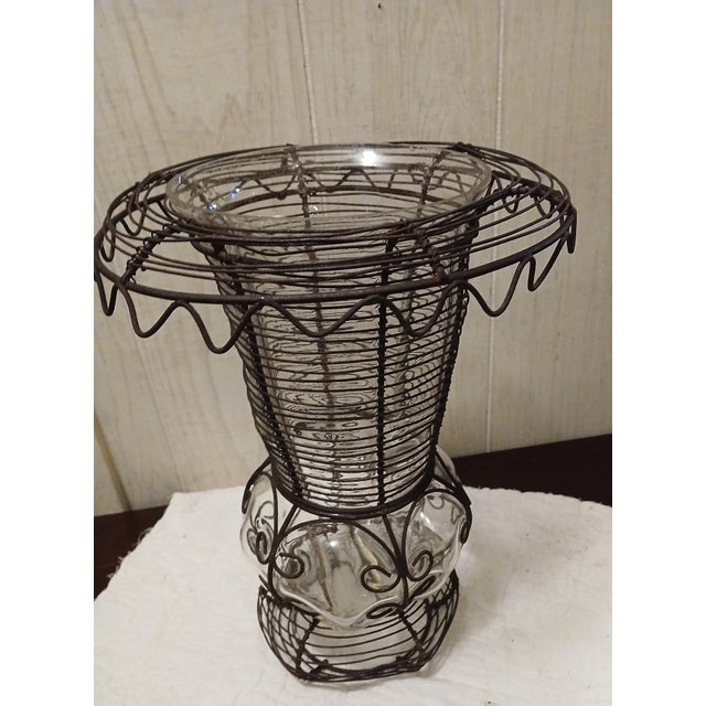 French pedestal base urn form caged glass twisted wire standing basket circa 1890-1910. Beautiful patina, some warping of...