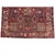 Vintage hand-knotted Bakhtiari rug featuring the classic Kheshti garden panel design, with individual compartments filled...