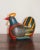Bright and handsomely painted wooden rooster handmade in Northern Thailand. Separates horizontally into two pieces to...