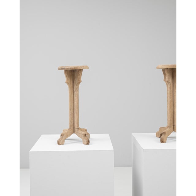 This pair of 20th Century French oak pedestals features a charming, handcrafted simplicity rooted in traditional French...