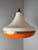 This pendant lamp from Denmark is a prime example of the optimistic and futuristic design of the Space Age. Its clean,...