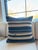 Single pillow made from a vintage African textile. This striped blue pillow features the most rich shades of blues from...