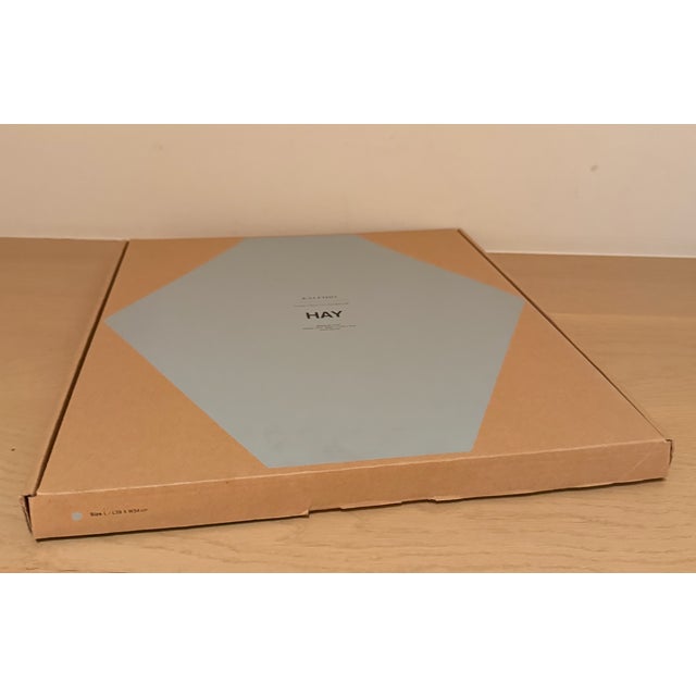 A large Kaleido tray by HAY, the Danish design brand known for its clean, functional aesthetic and thoughtful use of color...