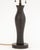 Giacometti Style Patinated Bronze Table Lamp, with two bulb fittings and black shade. 20.5" H x 12" Diameter. Provenance:...