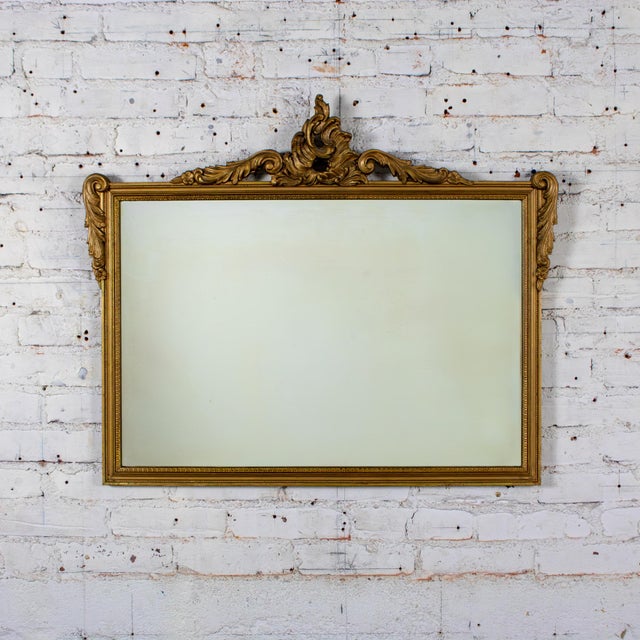 Rococo Early to Mid-20th Century Baroque or Rococo Style Wall Mirror With Carved Gilded Ornate Details For Sale - Image 3 of 18