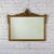 Rococo Early to Mid-20th Century Baroque or Rococo Style Wall Mirror With Carved Gilded Ornate Details For Sale - Image 3 of 18