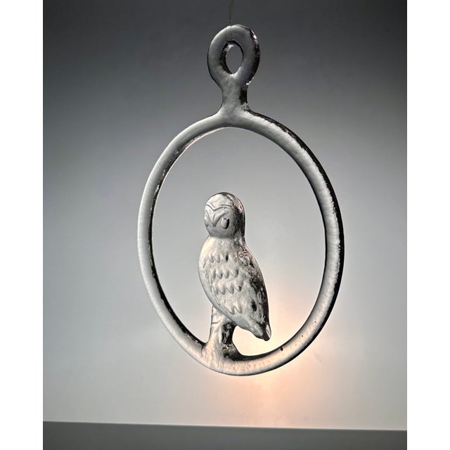 This striking crystal glass owl sun catcher or window decoration was designed by the renown glass artist Bertil Vallien...
