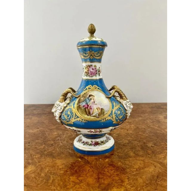 Fine quality pair of antique Victorian French severs lidded vases having fine quality hand painted oval panels with...