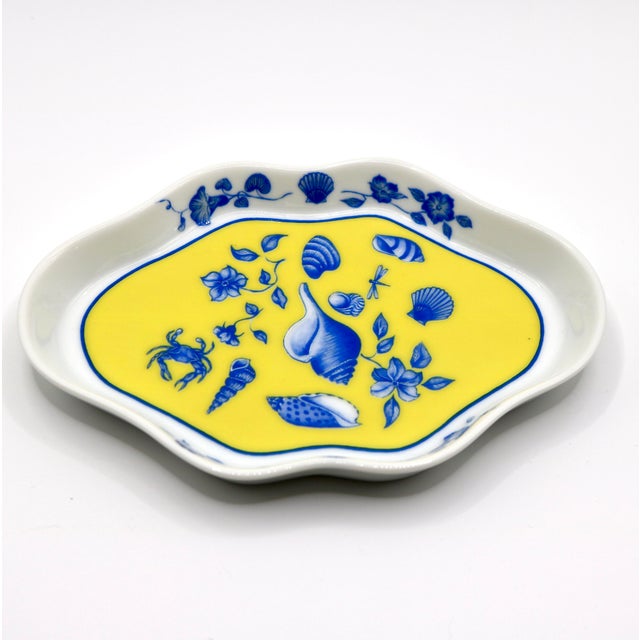 Add a vibrant pop of coastal elegance to your vanity, bedside, or tablescape with this vintage porcelain small leaf dish...