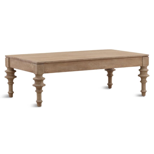 Natural mango wood distinctive coffee table which brings sculptural character and timeless warmth to your living space....