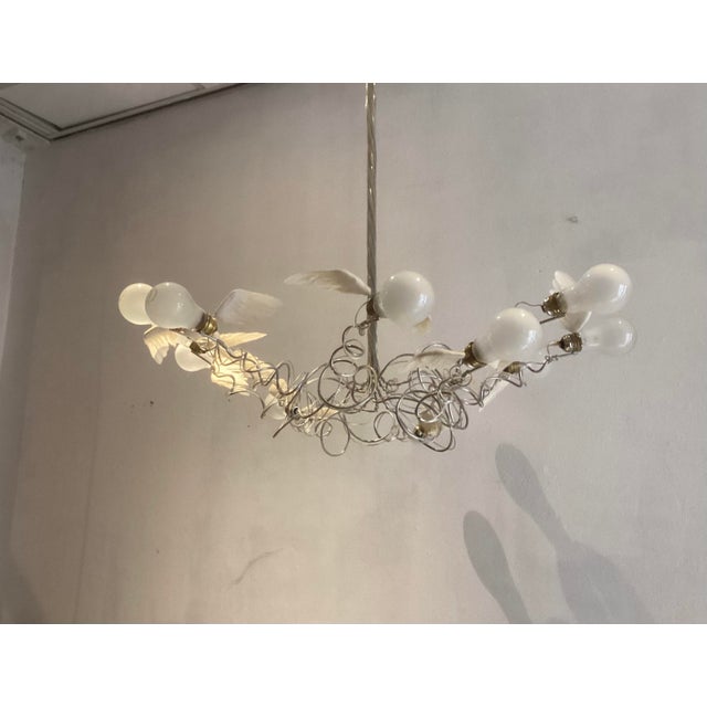 Ingo Maurer Birdie Lamp from Ingo Maurer, 1990s, in Very Good conditions. Designed 1990 to 1999 This piece has an...