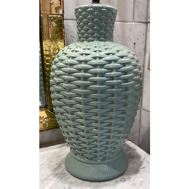 Ginger jar shaped plaster table lamp with distinctive basketweave design. In the style of John Dickinson, this lamp can be...