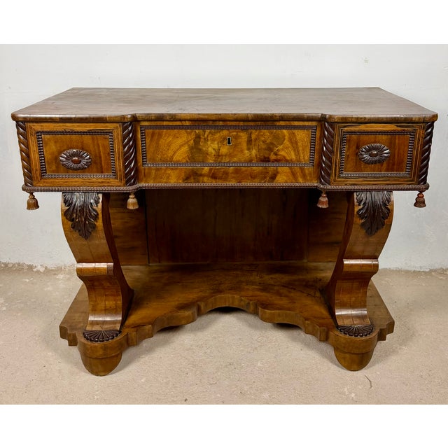 Elegant Art Deco style console table featuring a striking architectural design with one drawer. The clean geometric lines...