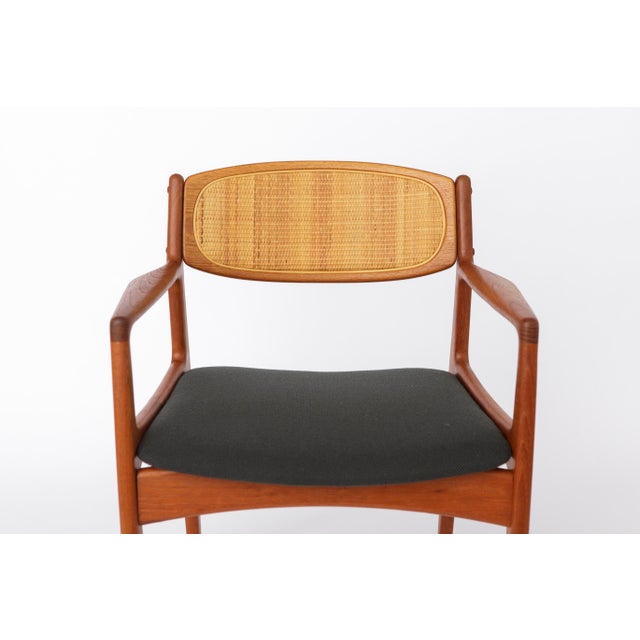 A beautifully crafted Danish Model 4325 carver chair designed by Ib Kofod-Larsen for Christian Linneberg Møbelfabrik. The...