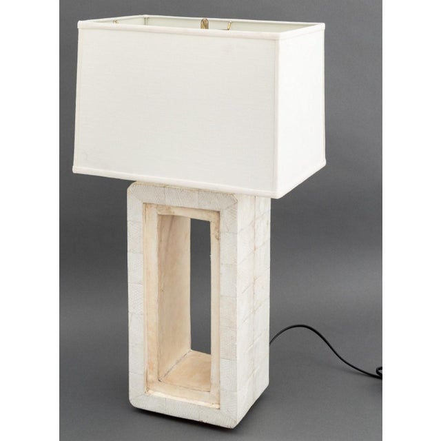 R&Y Augousti White Snakeskin Table Lamp, with white linen lampshade and marked with "Made in the Philippines" label to...