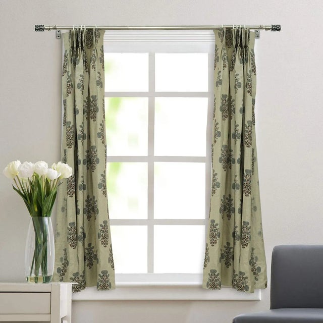 Experience timeless elegance with our Swadesh Handcrafted Block Print Curtain. Each piece is carefully hand-printed by...