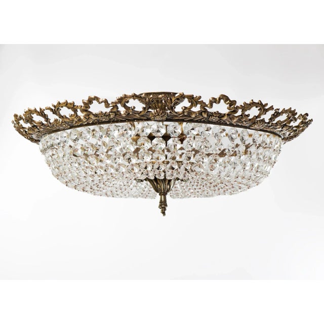 A vintage Spanish semi flush mount inverted basket-form chandelier made of original crystal in the form of diamonds of...