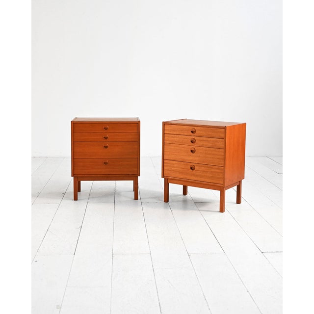 Set of two large teak nightstands with four drawers. Scandinavian production, 1960s. A pair of teak nightstands produced...