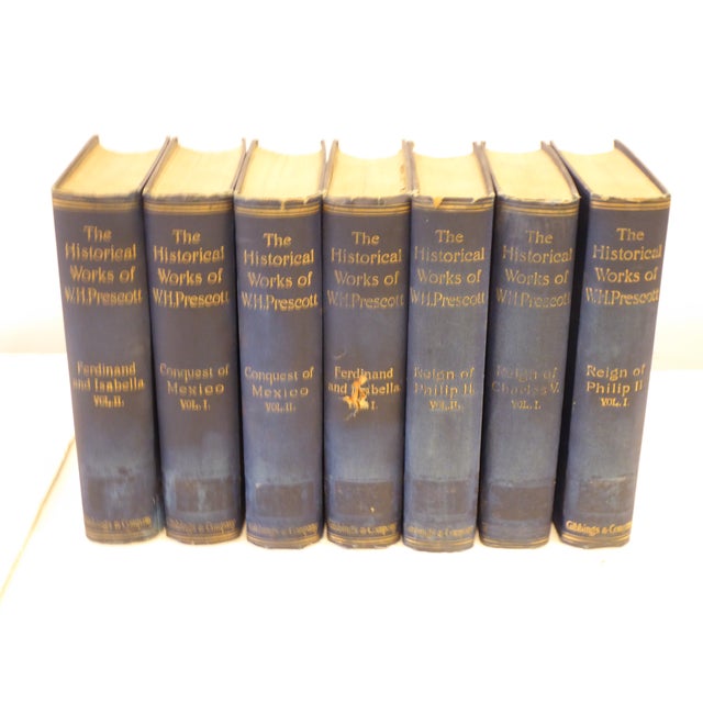 Collection of 7 linen wrapped volumes of William Prescott, 9.5"H x 14"L x 6"D. "Reign of Chas.V, 2 vols of Phillip II, 2...
