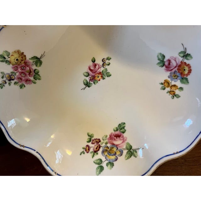 Antique 18th century Sevres porcelain shell shape dish decorated with bouquets of flowers. Measures 8 3/4" x 8 3/4" x 2"...
