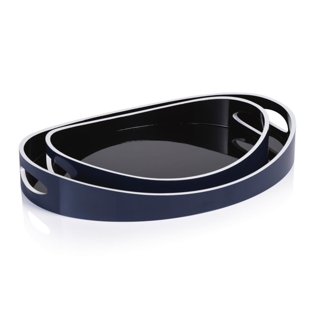 The Noir Marine Lacquered Serving Tray blends modern elegance with functional design. Featuring a deep navy blue exterior,...