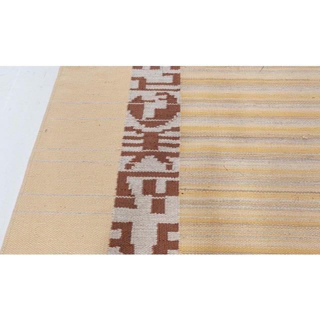 Finland Flat Woven Rug by Alestalon Mattokutomo Size: 5'5" × 7'10" (165 × 238 cm) This vintage Finnish flat-weave rug,...