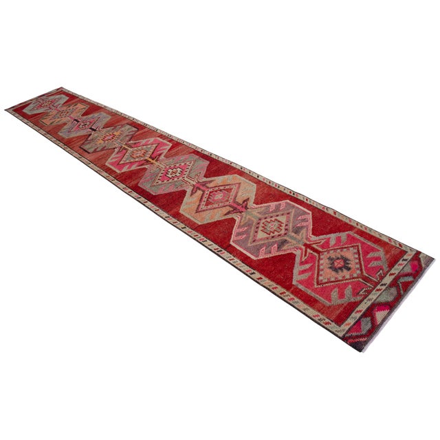 Woven in Southeastern Anatolia during the 1950s, this striking runner rug embodies the enduring legacy of nomadic...