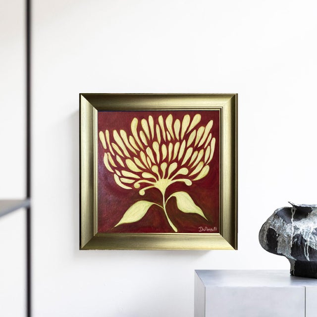 Finished in a brushed gold frame that beautifully echoes the warm golden tones of the flower. Ready to hang as acquired....