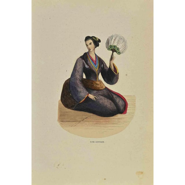 Japanese Lady is a lithograph made by Auguste Wahlen in 1844. Hand colored. Good condition. At the center of the artwork...