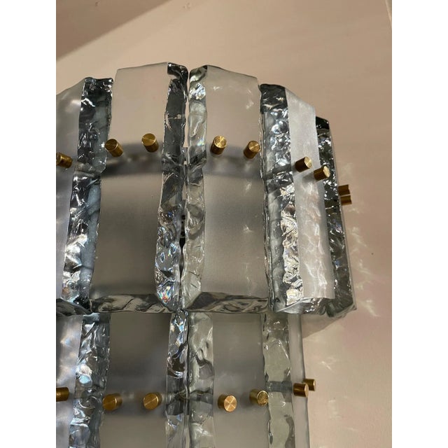 Beautiful pair of pale green Murano glass and brass sconces. Creates a super stylish look. Lovely!