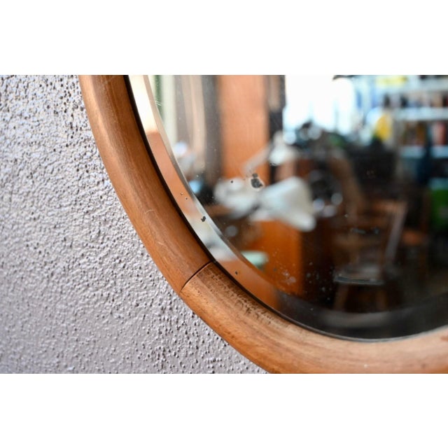 This 1960s dressing table mirror boasts generous, curvaceous lines, showcasing the softness and beauty of its solid oak...