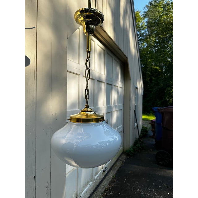 Old Lights On is pleased to offer this vintage school house globe with brass hanging fixture. It is wired and ready to...